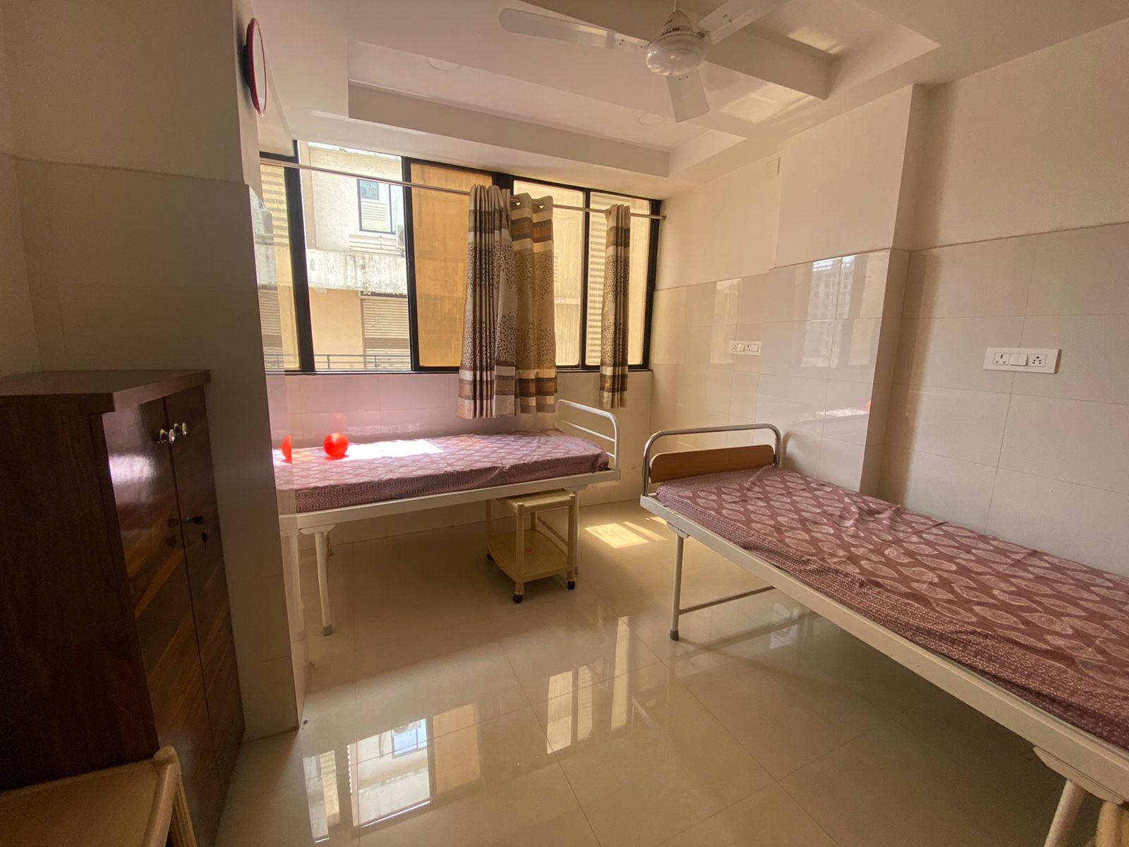 Comfortable patient room with two beds